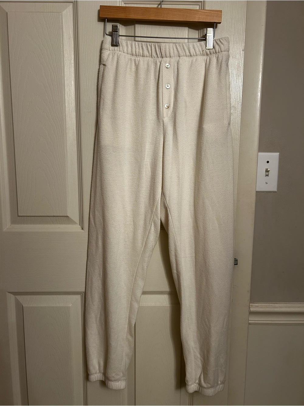 DONNI. cream fleece joggers S